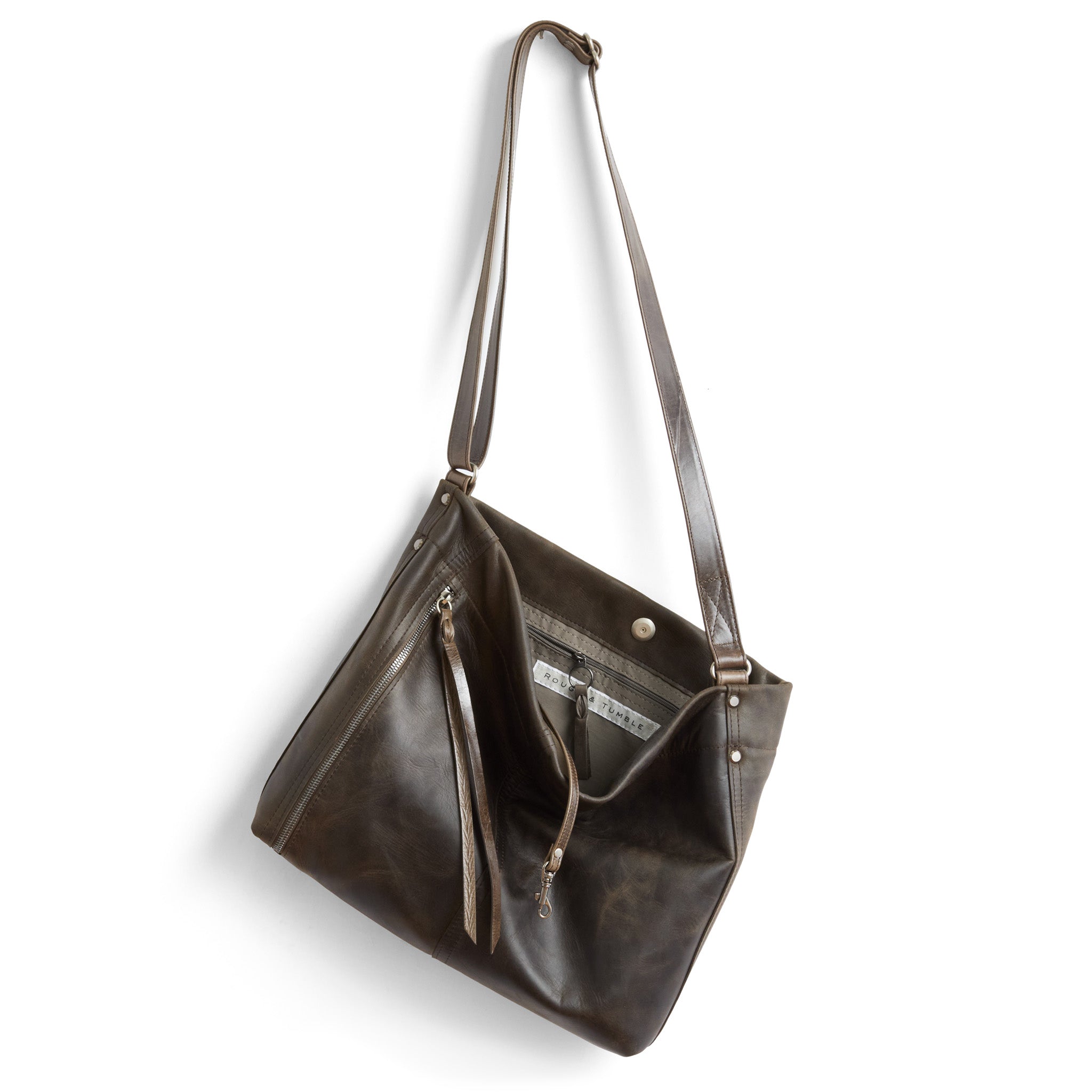 canyon in rubble tusk, showcasing interior zippered pocket and essex lining