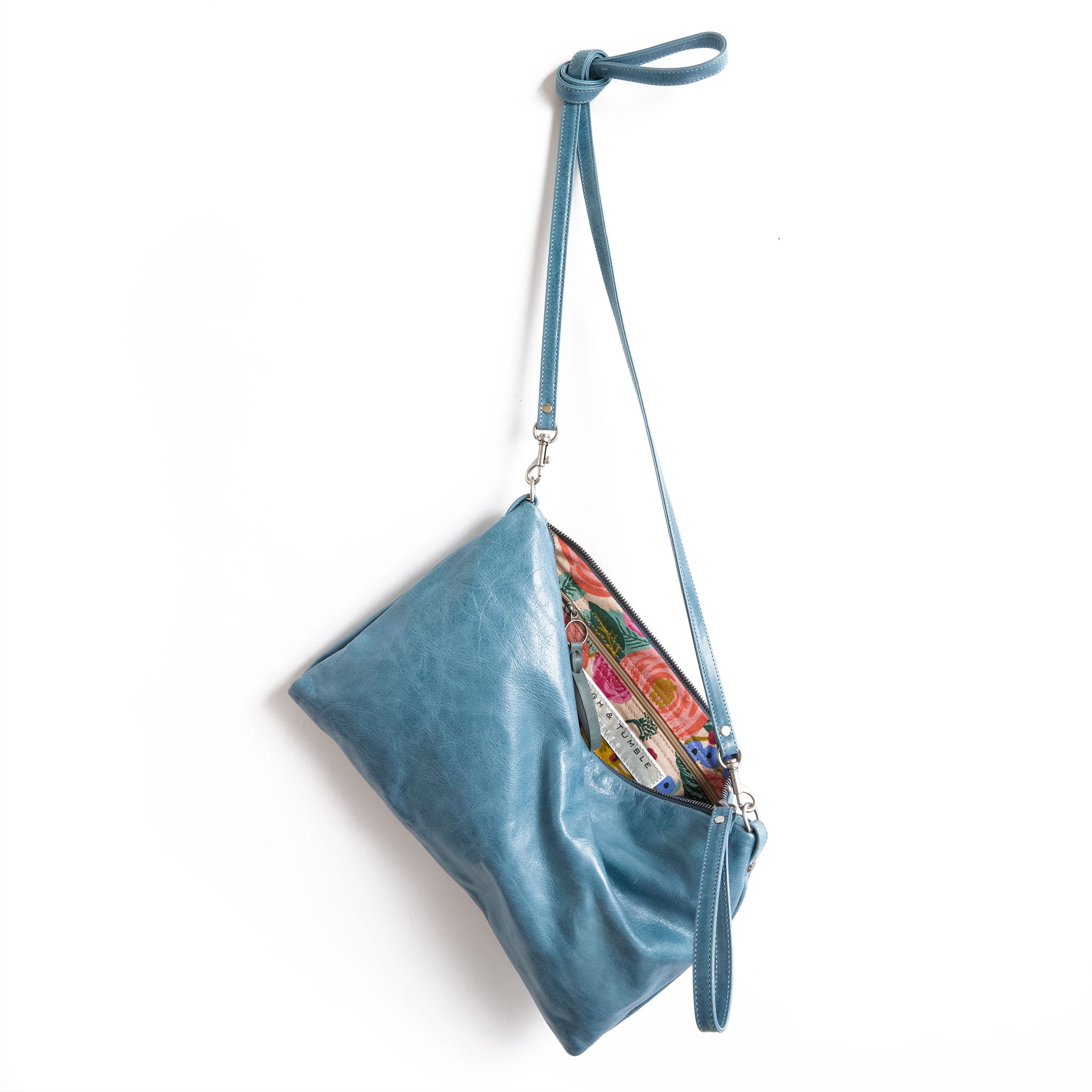 the covet in camden, showcasing interior rifle paper co. juliet rose cream lining and zippered pocket