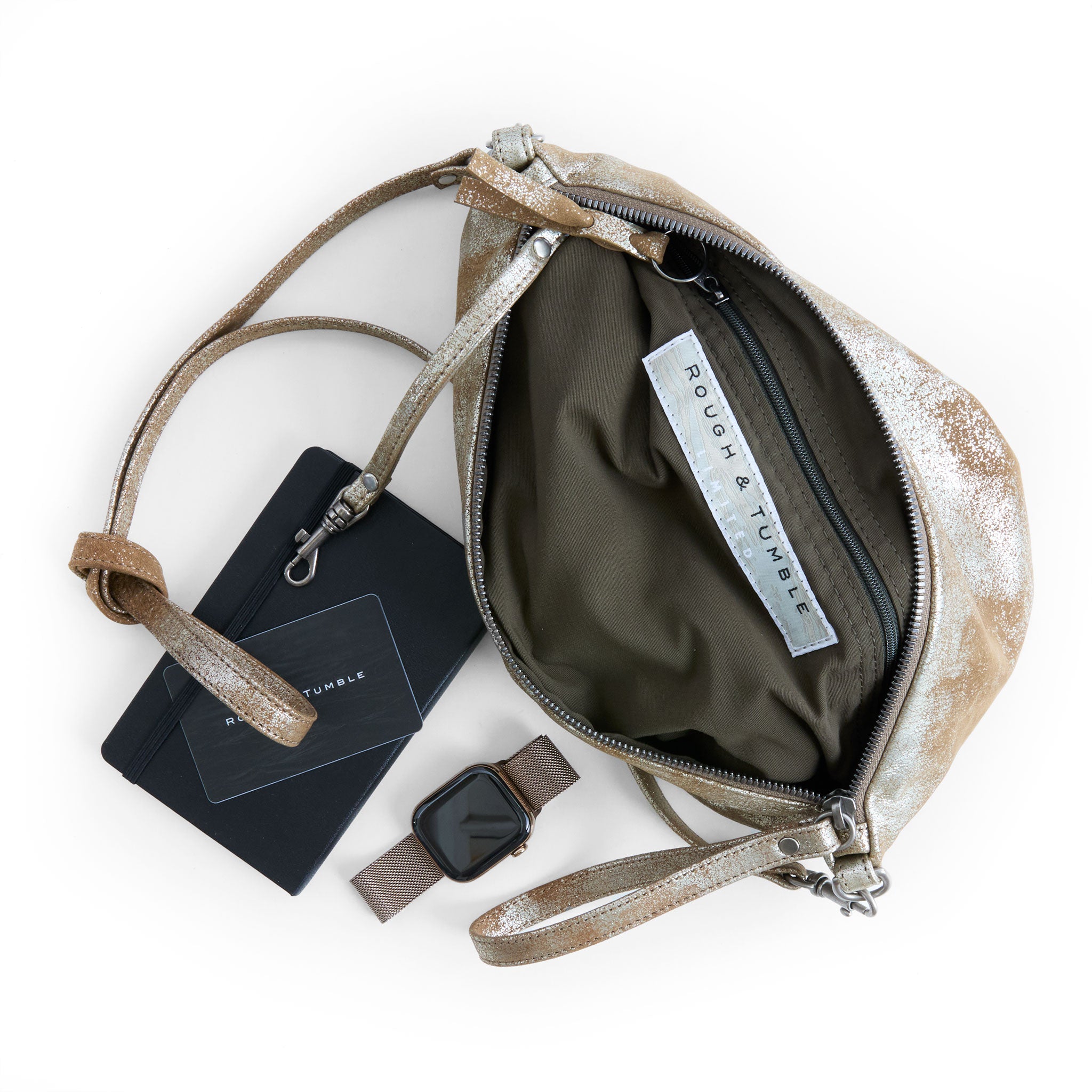 the covet in double gilded mink, showcasing interior kelp lining and zippered pocket