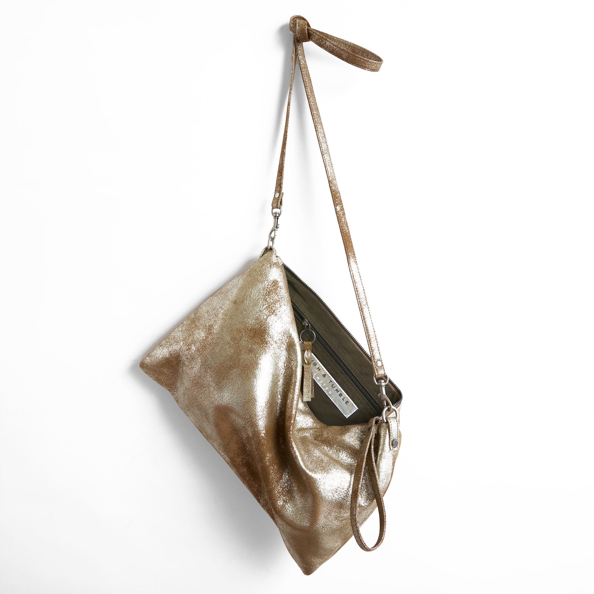 covet in double gilded mink, showcasing interior kelp lining and zippered pocket