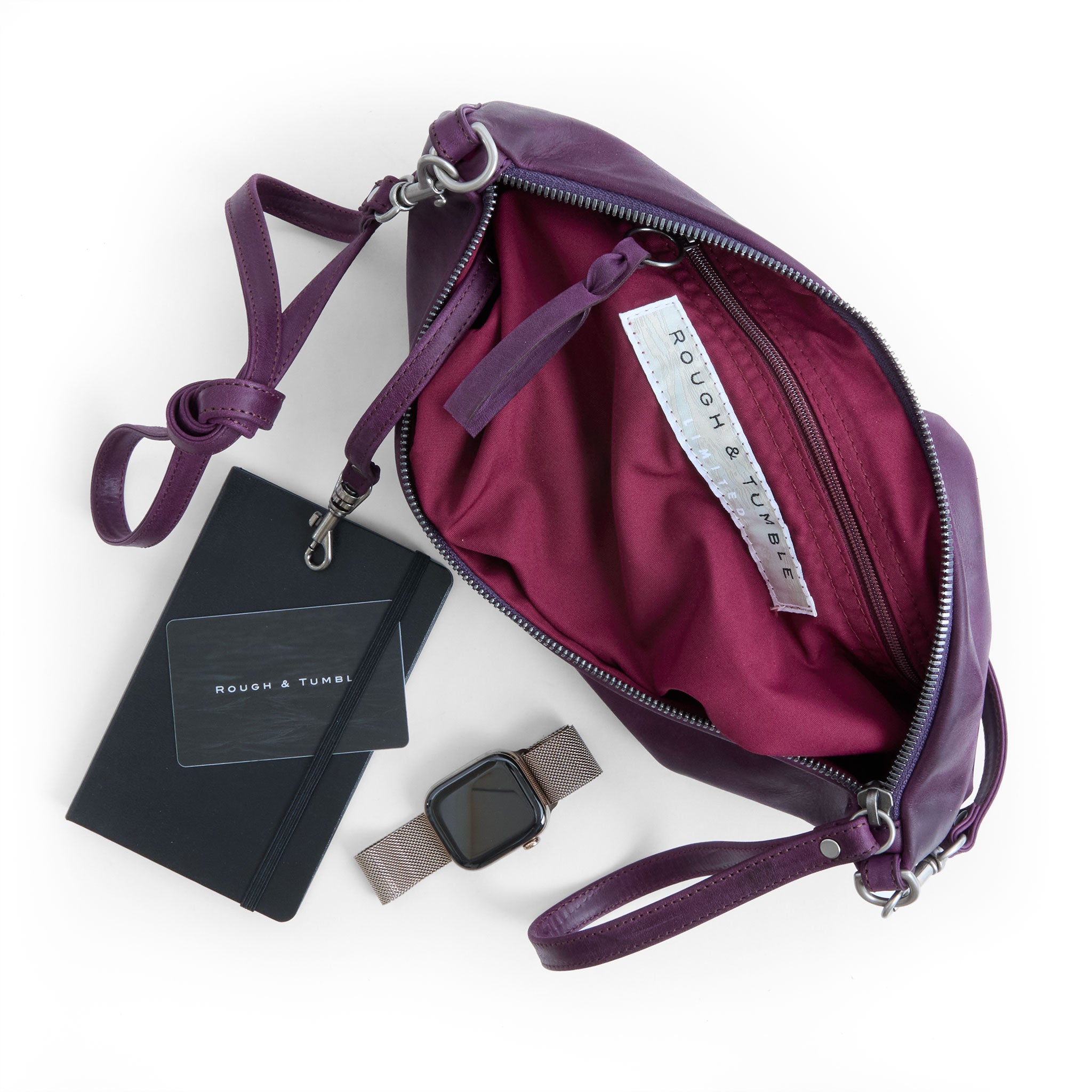 the covet in rustic eggplant, showcasing interior jam lining and zippered pocket
