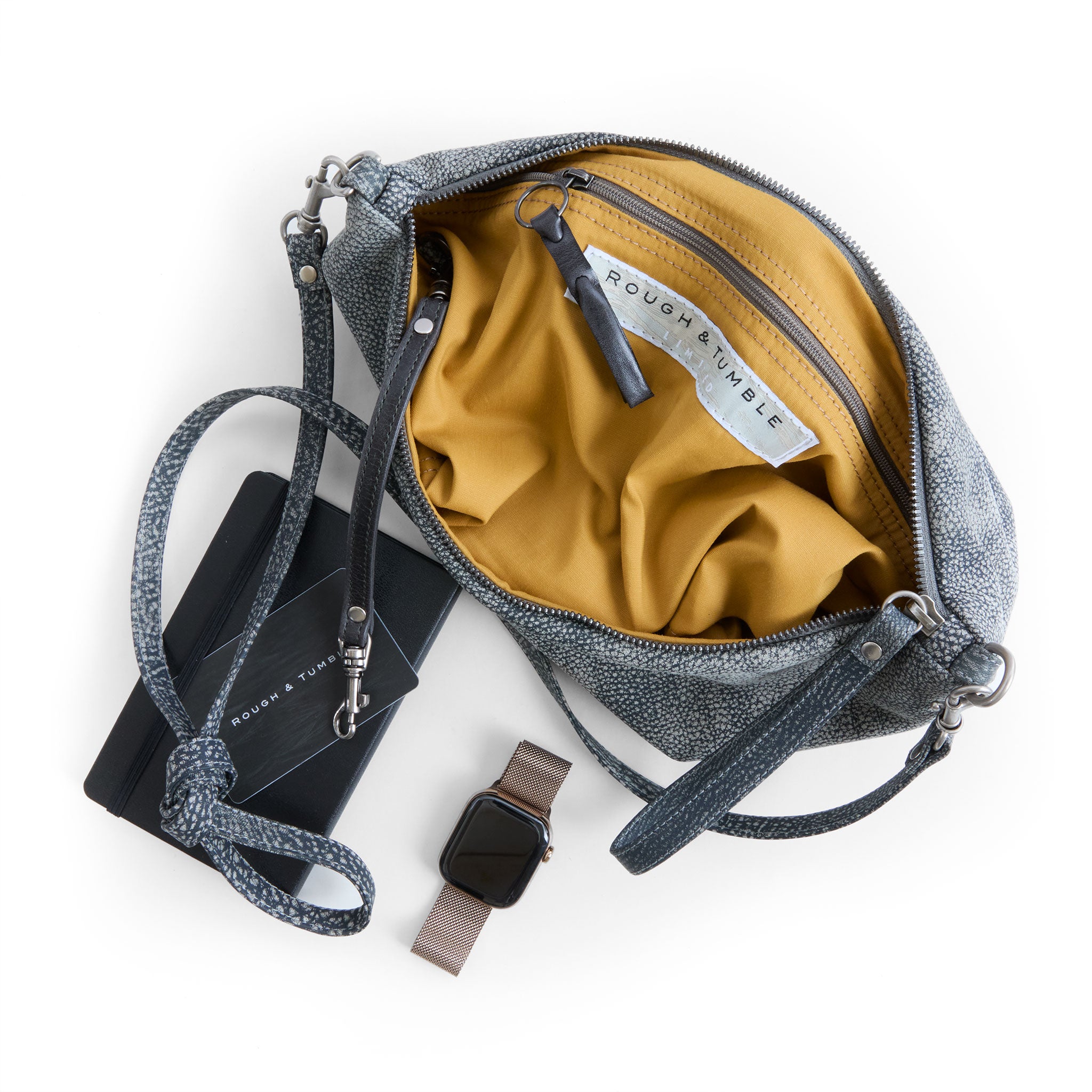 the covet in elephant ear, showcasing interior bumble lining and zippered pocket