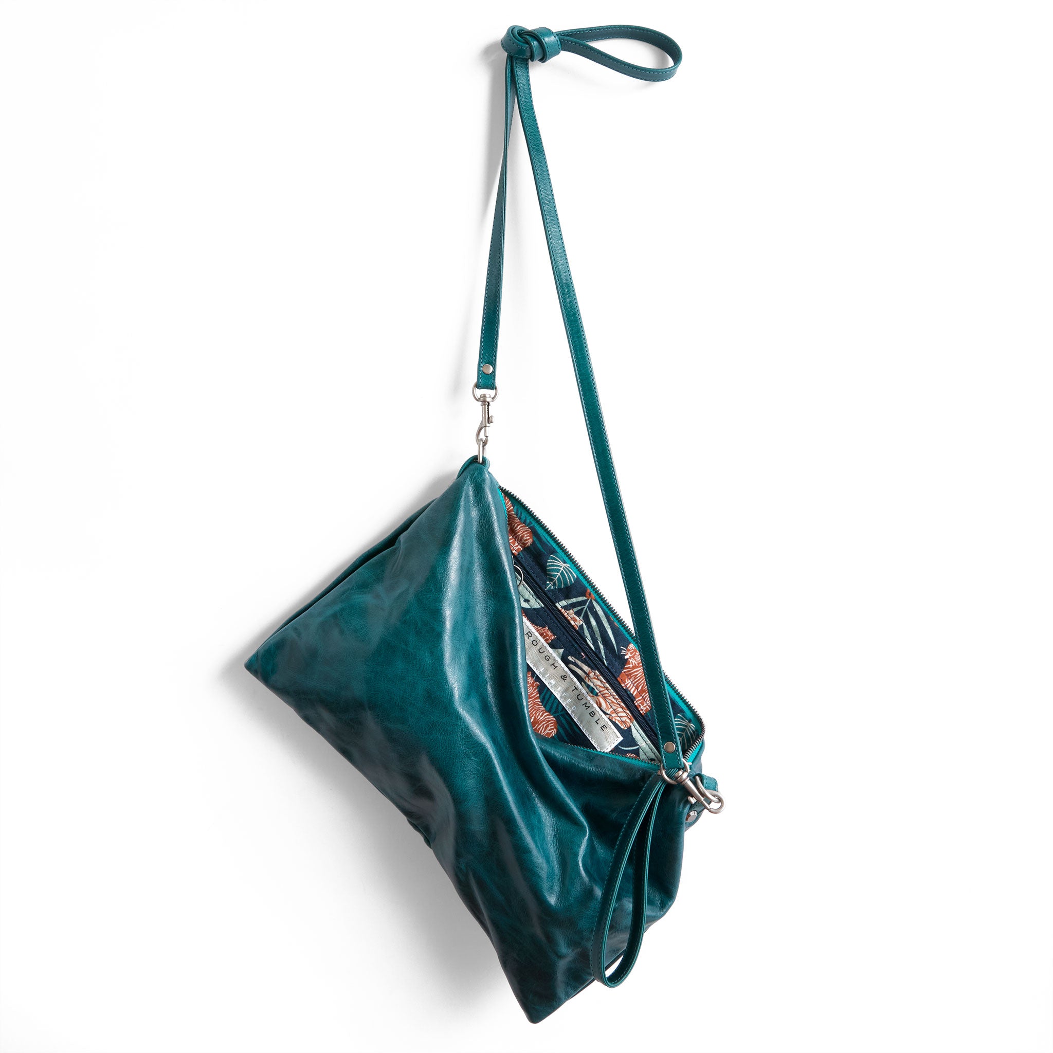 the covet in tourmaline, showcasing interior jungle cruisin' lining and zippered pocket