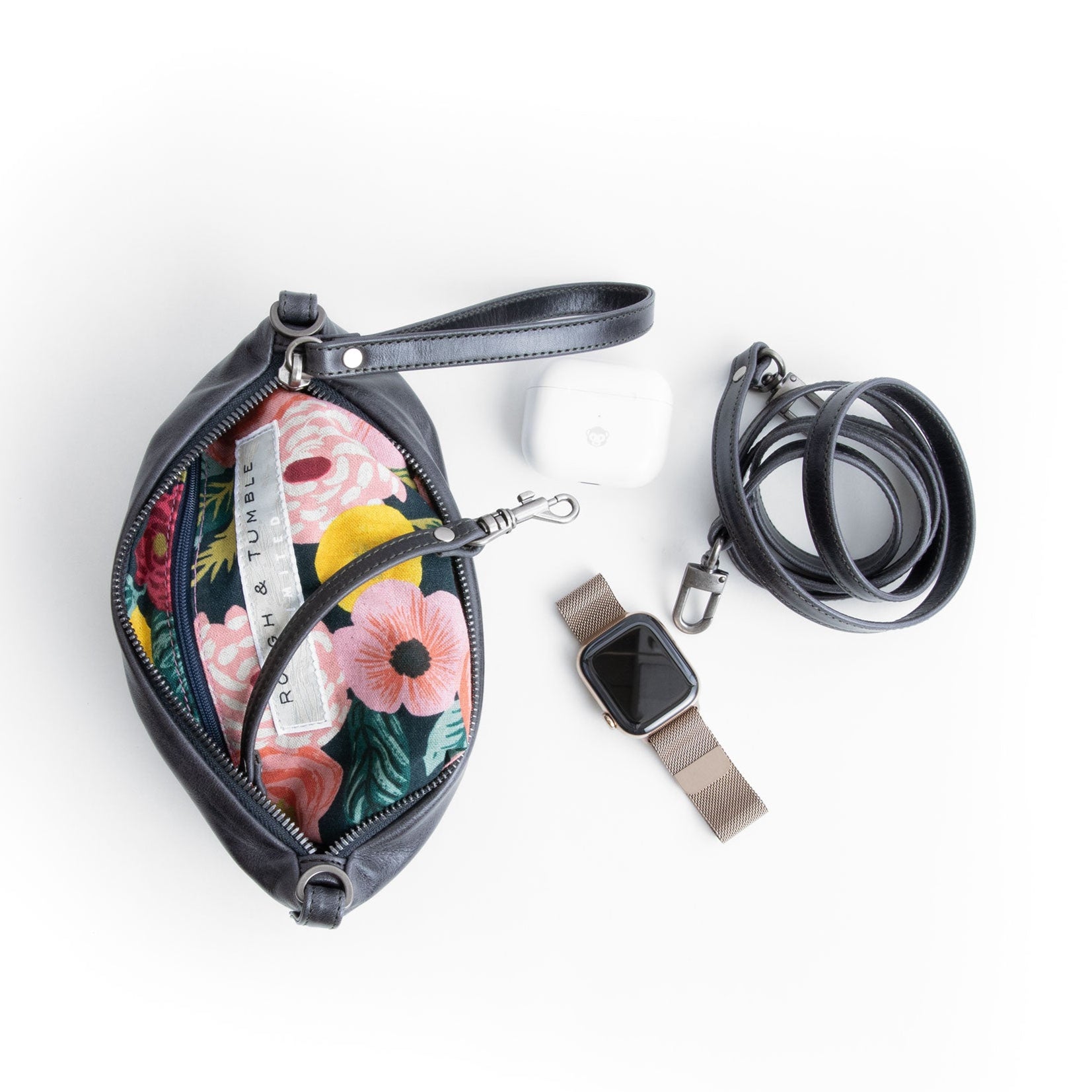 small pinched bottom traveler in falcon, showcasing interior rifle co juliet rose navy lining