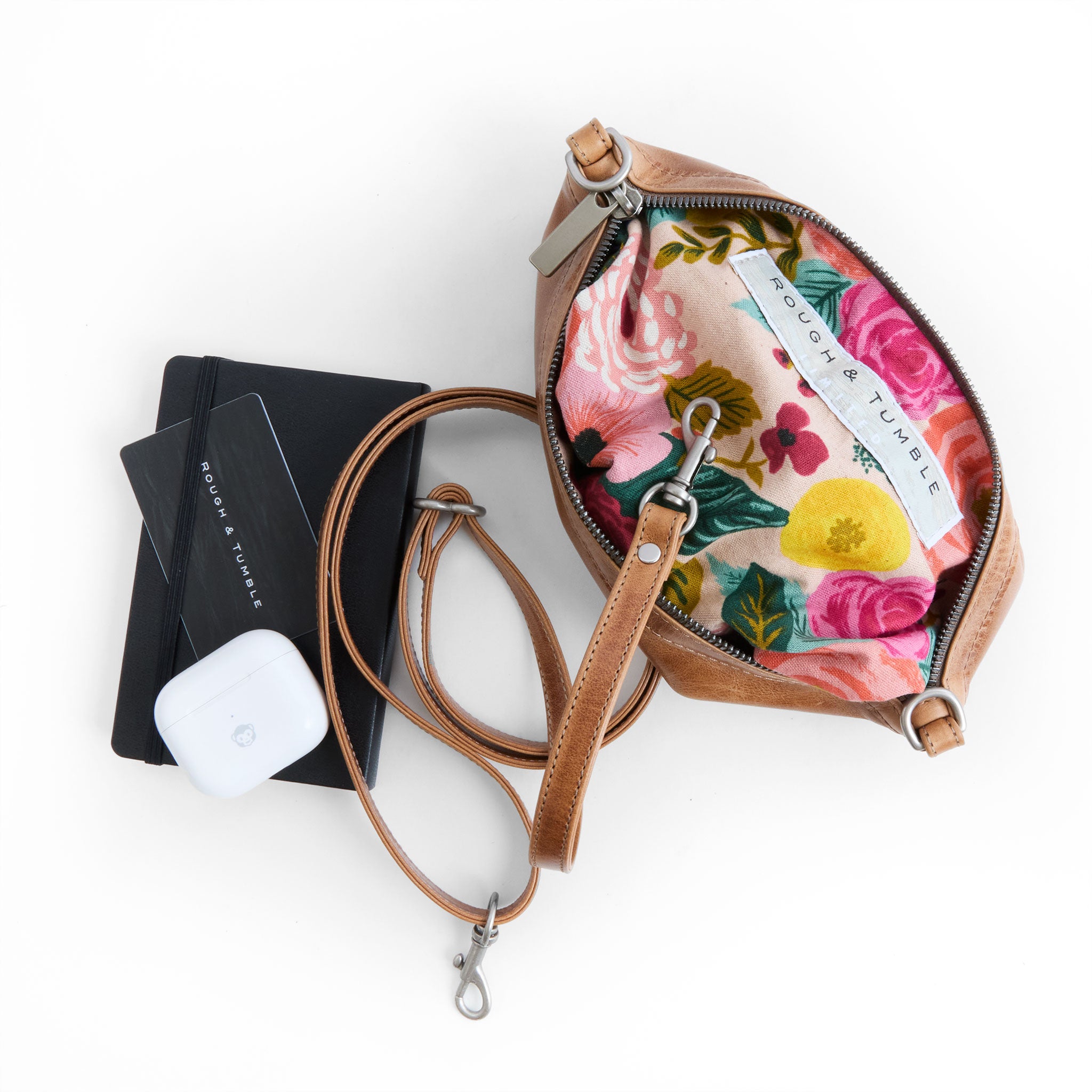 wren in light saddle, showcasing interior rifle co juliet rose cream lining