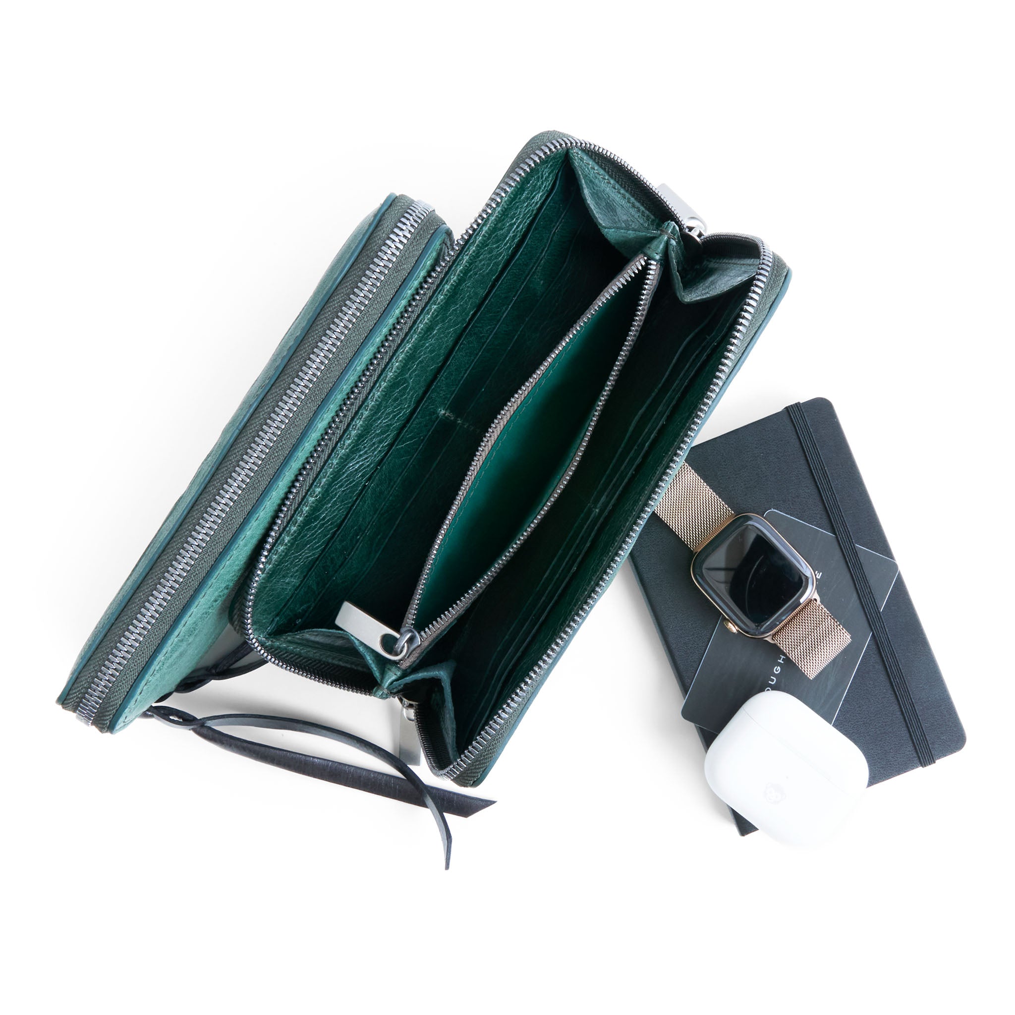 wallets in milano caspian, one with falcon leather pulls and one with italian metal pulls, showcasing interior compartments