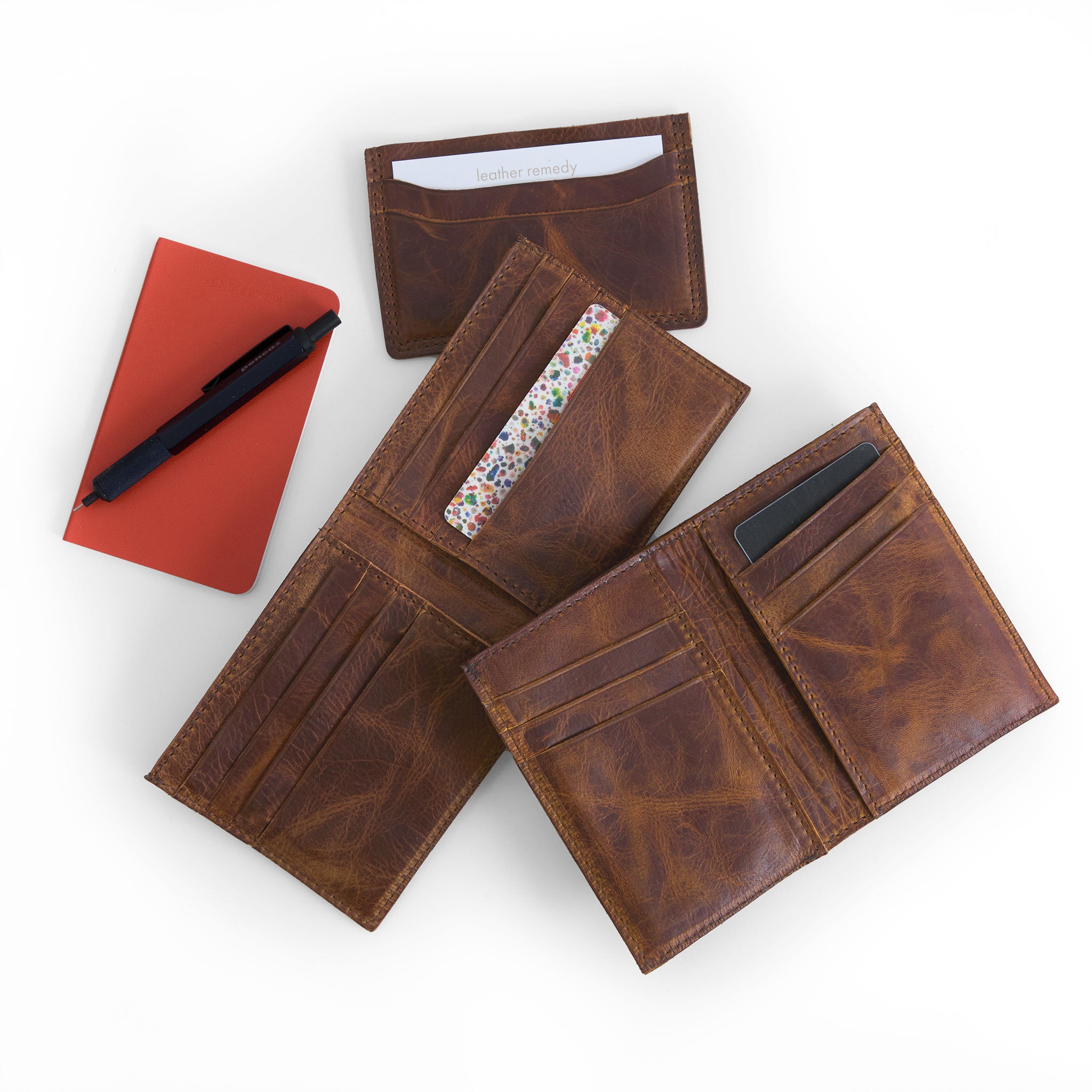 slim and classic wallets in weathered cigar, classic on left, slim on right