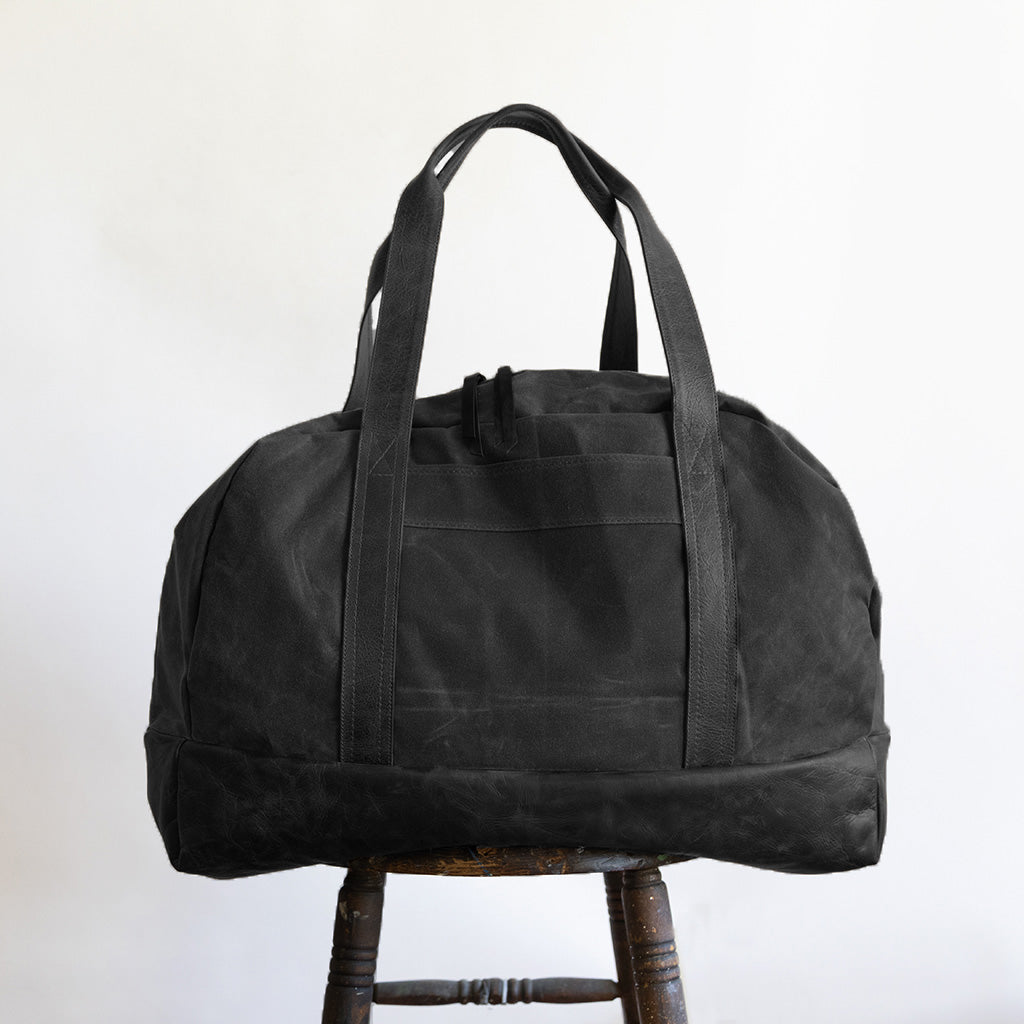 weekender in black waxed canvas