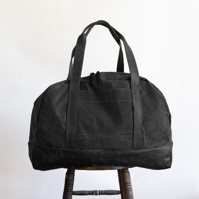 black waxed canvas + tumbled black | weekender in black waxed canvas