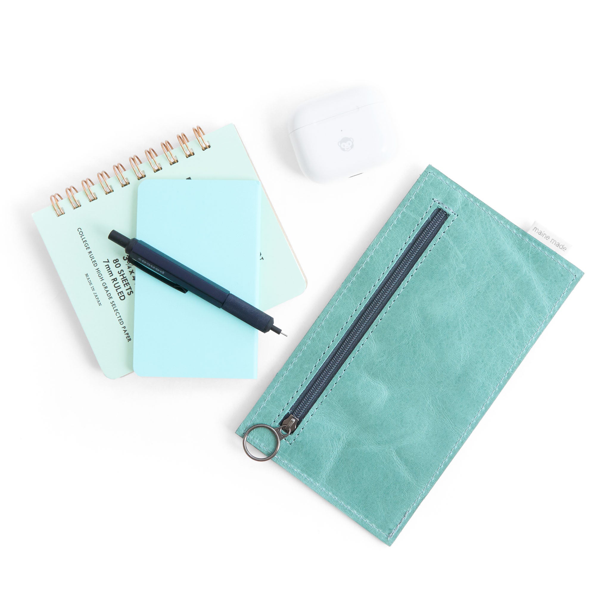zip quad in tiffany, showcasing zippered pocket