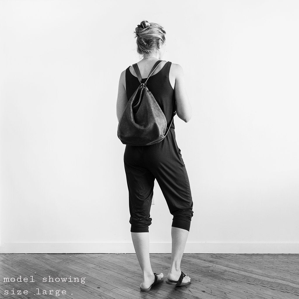 model wearing boho e+w size large in backpack setting 