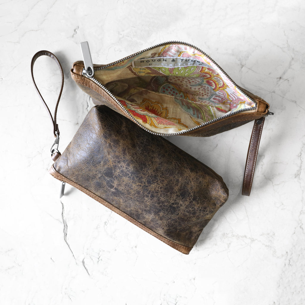 two zip pouches with top stripe large in dingo with vintage brown, one pouch is open showing interior with semifredo lining 